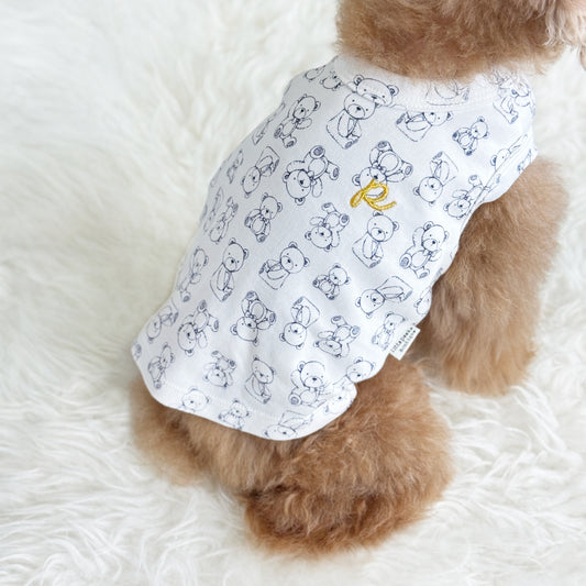Shinee (Red Toy Poodle) wearing a white top with teddy bear print pattern - Teddy Baby Sleeveless Tee (also available in other designs) sold at Velymon SG